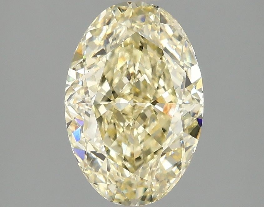 Loose Diamond - OVAL 2.1ct Fancy Intense Yellow VS1: Loose Diamond - OVAL 2.1ct Fancy Intense Yellow VS1 Source: This is a real non-mined Diamond that has been grown in a lab Shape: OVAL Carats: 2.1 Color: Fancy Intense Yellow Certification: IGI Video: