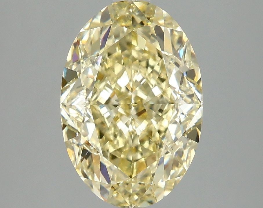 Loose Diamond - OVAL 3.1ct Fancy Intense Yellow VVS2: Loose Diamond - OVAL 3.1ct Fancy Intense Yellow VVS2 Source: This is a real non-mined Diamond that has been grown in a lab Shape: OVAL Carats: 3.1 Color: Fancy Intense Yellow Certification: IGI Video:
