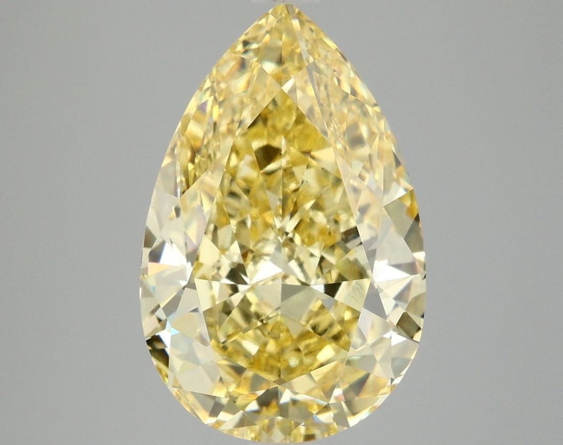 Loose Diamond - PEAR 5.06ct Fancy Vivid Yellow VS1: Loose Diamond - PEAR 5.06ct Fancy Vivid Yellow VS1 Source: This is a real non-mined Diamond that has been grown in a lab Shape: PEAR Carats: 5.06 Color: Fancy Vivid Yellow Certification: IGI Video: