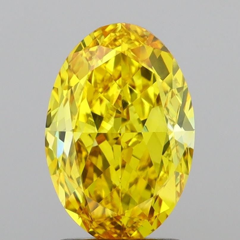 Loose Diamond - OVAL 2.06ct Fancy Vivid Yellow VS2: Loose Diamond - OVAL 2.06ct Fancy Vivid Yellow VS2 Source: This is a real non-mined Diamond that has been grown in a lab Shape: OVAL Carats: 2.06 Color: Fancy Vivid Yellow Certification: IGI Video: