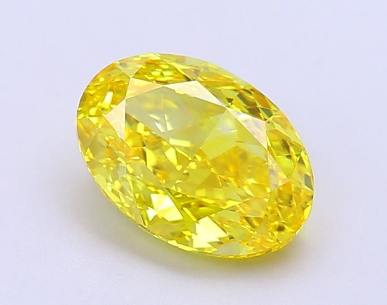 Loose Diamond - OVAL 2.05ct Fancy Vivid Yellow VVS2: Loose Diamond - OVAL 2.05ct Fancy Vivid Yellow VVS2 Source: This is a real non-mined Diamond that has been grown in a lab Shape: OVAL Carats: 2.05 Color: Fancy Vivid Yellow Certification: IGI Video:
