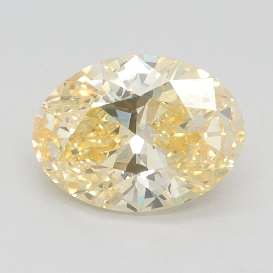 Loose Diamond - OVAL 2.08ct Fancy Vivid Yellow VVS2: Loose Diamond - OVAL 2.08ct Fancy Vivid Yellow VVS2 Source: This is a real non-mined Diamond that has been grown in a lab Shape: OVAL Carats: 2.08 Color: Fancy Vivid Yellow Certification: IGI Video: