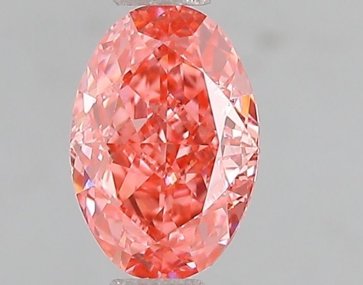 Loose Diamond - OVAL 1.09ct Fancy Vivid Pink VS2: Loose Diamond - OVAL 1.09ct Fancy Vivid Pink VS2 Source: This is a real non-mined Diamond that has been grown in a lab Shape: OVAL Carats: 1.09 Color: Fancy Vivid Pink Certification: IGI Video: