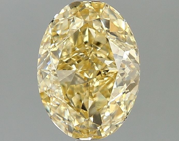 Loose Diamond - OVAL 2.06ct Fancy Vivid Yellow VVS2: Loose Diamond - OVAL 2.06ct Fancy Vivid Yellow VVS2 Source: This is a real non-mined Diamond that has been grown in a lab Shape: OVAL Carats: 2.06 Color: Fancy Vivid Yellow Certification: IGI Video:
