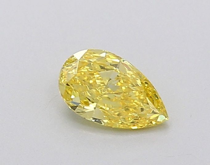 Loose Diamond - PEAR 0.29ct Fancy Vivid Yellow VS1: Loose Diamond - PEAR 0.29ct Fancy Vivid Yellow VS1 Source: This is a real non-mined Diamond that has been grown in a lab Shape: PEAR Carats: 0.29 Color: Fancy Vivid Yellow Certification: IGI Video: