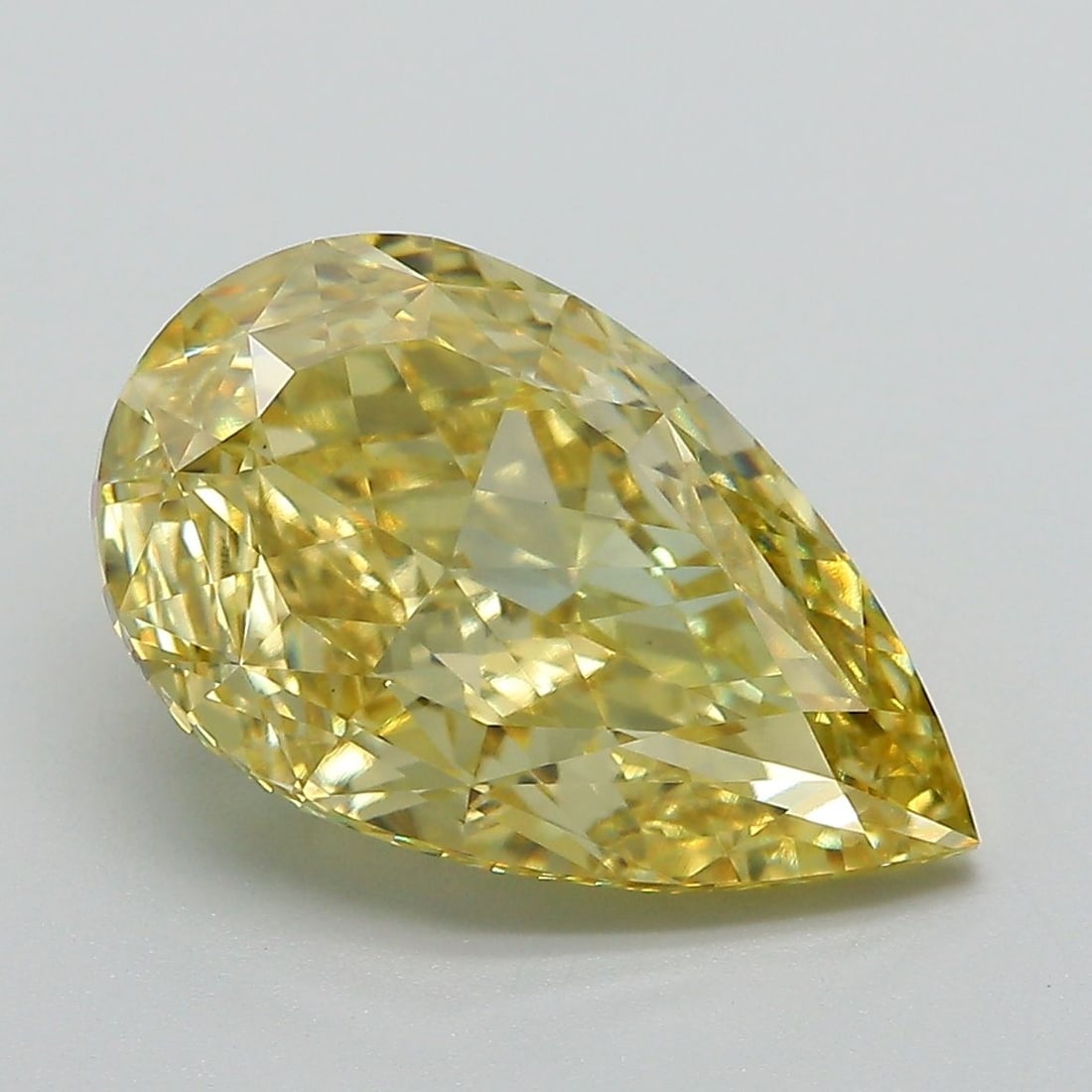 Loose Diamond - PEAR 5.14ct Fancy Vivid Yellow VS1: Loose Diamond - PEAR 5.14ct Fancy Vivid Yellow VS1 Source: This is a real non-mined Diamond that has been grown in a lab Shape: PEAR Carats: 5.14 Color: Fancy Vivid Yellow Certification: IGI Video: