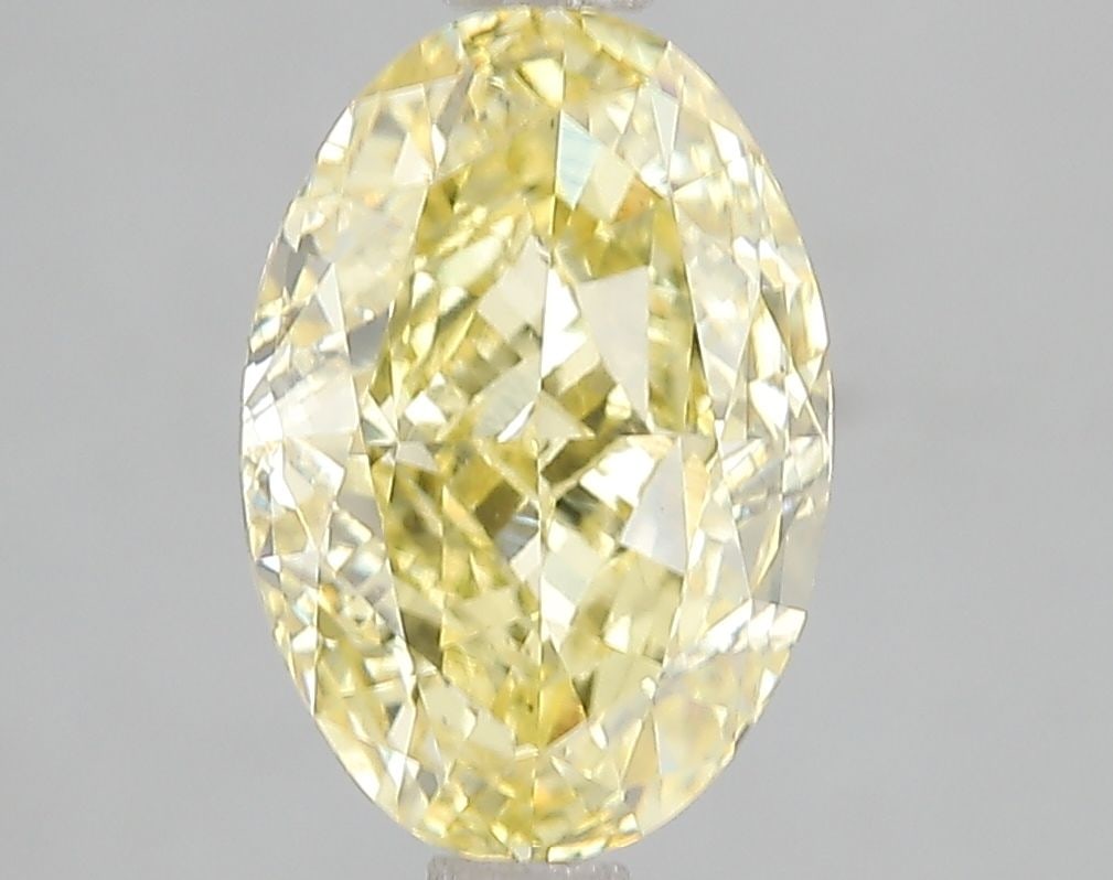 Loose Diamond - OVAL 3.0ct Fancy Vivid Yellow VS1: Loose Diamond - OVAL 3.0ct Fancy Vivid Yellow VS1 Source: This is a real non-mined Diamond that has been grown in a lab Shape: OVAL Carats: 3.0 Color: Fancy Vivid Yellow Certification: IGI Video: