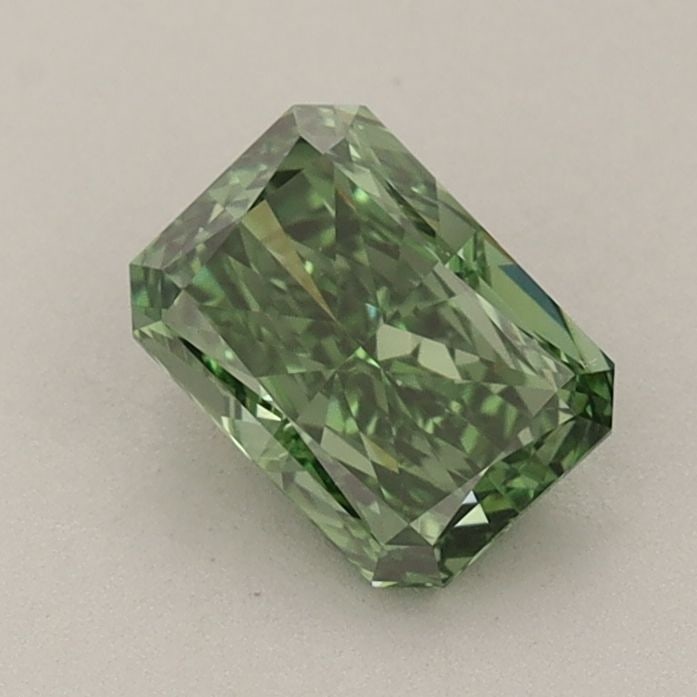 Loose Diamond - RADIANT 0.82ct Fancy Vivid Green VVS2: Loose Diamond - RADIANT 0.82ct Fancy Vivid Green VVS2 Source: This is a real non-mined Diamond that has been grown in a lab Shape: RADIANT Carats: 0.82 Color: Fancy Vivid Green Certification: IGI Vide