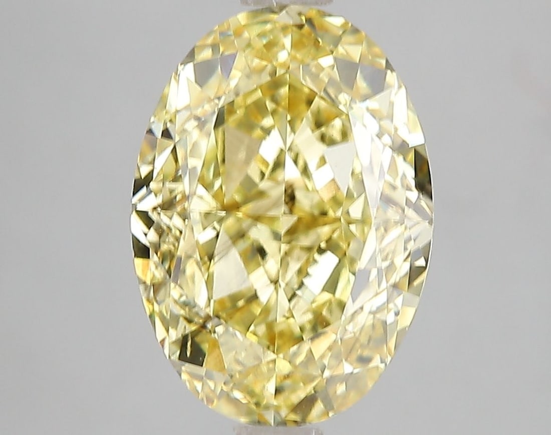 Loose Diamond - OVAL 5.17ct Fancy Vivid Yellow SI1: Loose Diamond - OVAL 5.17ct Fancy Vivid Yellow SI1 Source: This is a real non-mined Diamond that has been grown in a lab Shape: OVAL Carats: 5.17 Color: Fancy Vivid Yellow Certification: IGI Video: