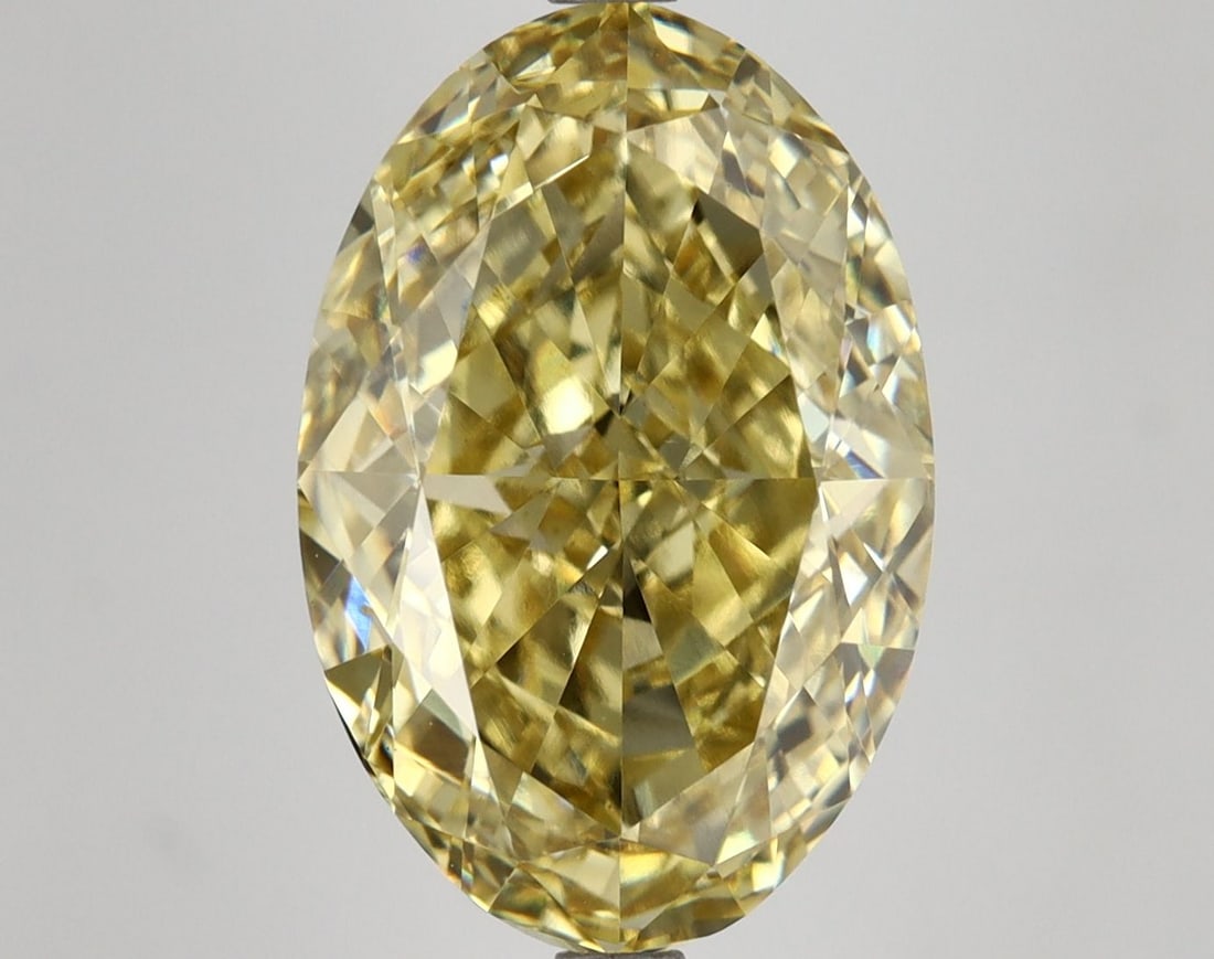 Loose Diamond - OVAL 7.27ct Fancy Intense Yellow VS1: Loose Diamond - OVAL 7.27ct Fancy Intense Yellow VS1 Source: This is a real non-mined Diamond that has been grown in a lab Shape: OVAL Carats: 7.27 Color: Fancy Intense Yellow Certification: IGI Video