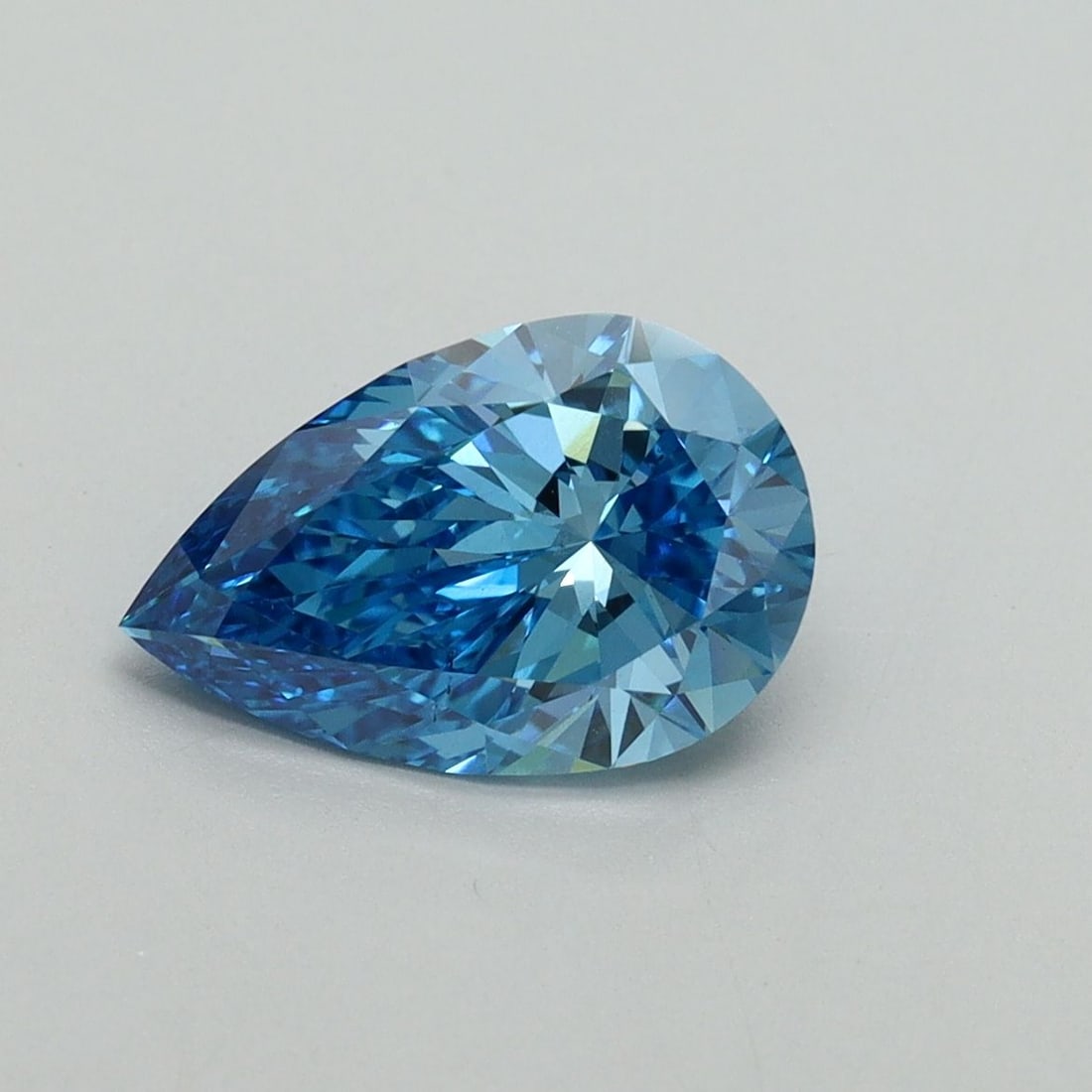 Loose Diamond - PEAR 1.55ct Fancy Vivid Blue VS2: Loose Diamond - PEAR 1.55ct Fancy Vivid Blue VS2 Source: This is a real non-mined Diamond that has been grown in a lab Shape: PEAR Carats: 1.55 Color: Fancy Vivid Blue Certification: IGI Video: