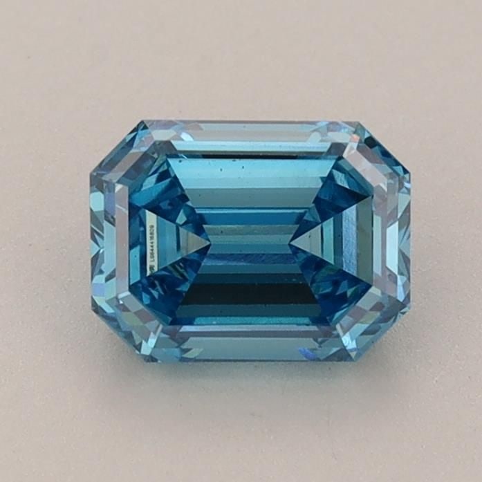 Loose Diamond - EMERALD 0.95ct Fancy Vivid Blue VS1: Loose Diamond - EMERALD 0.95ct Fancy Vivid Blue VS1 Source: This is a real non-mined Diamond that has been grown in a lab Shape: EMERALD Carats: 0.95 Color: Fancy Vivid Blue Certification: IGI Video: