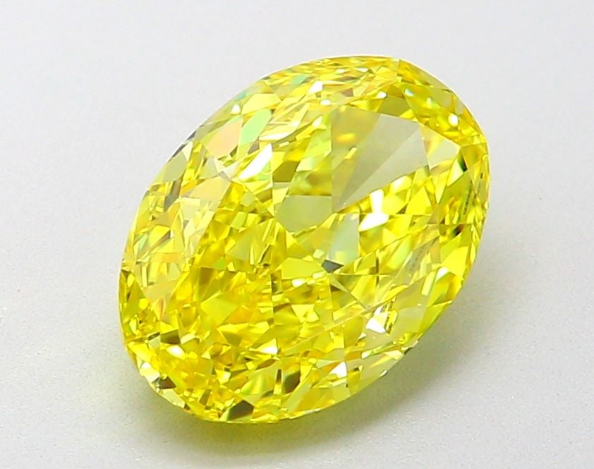 Loose Diamond - OVAL 2.05ct Fancy Vivid Yellow VVS2: Loose Diamond - OVAL 2.05ct Fancy Vivid Yellow VVS2 Source: This is a real non-mined Diamond that has been grown in a lab Shape: OVAL Carats: 2.05 Color: Fancy Vivid Yellow Certification: IGI Video:
