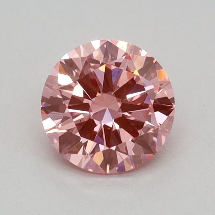 Loose Diamond - ROUND 0.36ct Fancy Vivid Pink VS1: Loose Diamond - ROUND 0.36ct Fancy Vivid Pink VS1 Source: This is a real non-mined Diamond that has been grown in a lab Shape: ROUND Carats: 0.36 Color: Fancy Vivid Pink Certification: IGI Video: