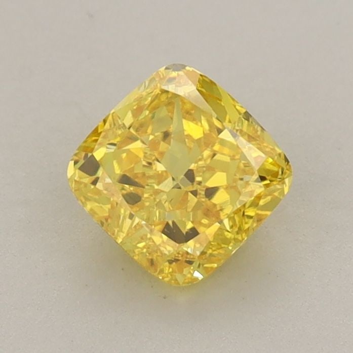 Loose Diamond - CUSHION MODIFIED 0.79ct Fancy Vivid Yellow VS1: Loose Diamond - CUSHION MODIFIED 0.79ct Fancy Vivid Yellow VS1 Source: This is a real non-mined Diamond that has been grown in a lab Shape: CUSHION MODIFIED Carats: 0.79 Color: Fancy Vivid Yellow Cert