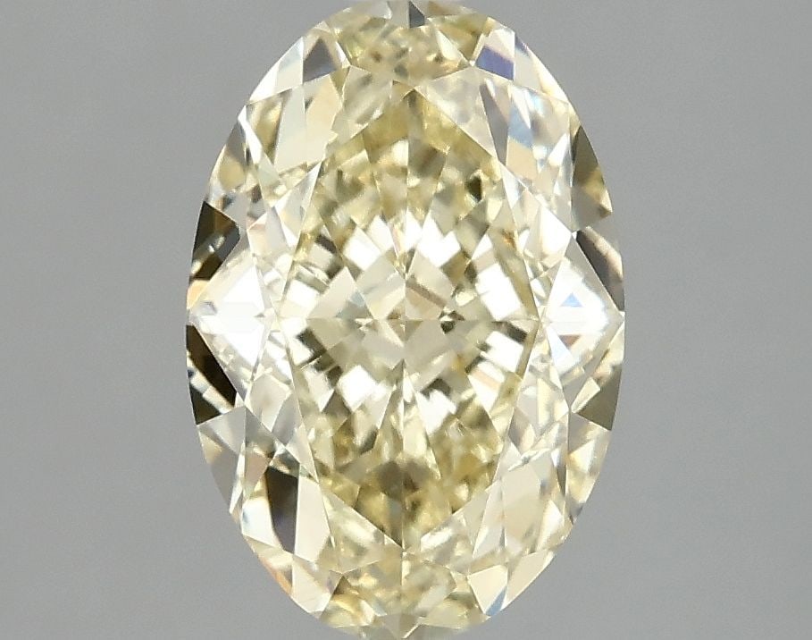 Loose Diamond - OVAL 3.1ct Fancy Vivid Yellow VVS2: Loose Diamond - OVAL 3.1ct Fancy Vivid Yellow VVS2 Source: This is a real non-mined Diamond that has been grown in a lab Shape: OVAL Carats: 3.1 Color: Fancy Vivid Yellow Certification: IGI Video: