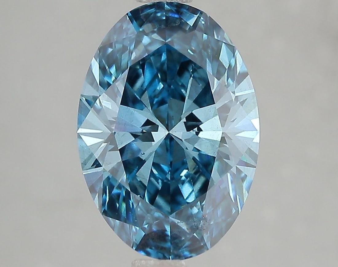 Loose Diamond - OVAL 3.08ct Fancy Vivid Blue SI1: Loose Diamond - OVAL 3.08ct Fancy Vivid Blue SI1 Source: This is a real non-mined Diamond that has been grown in a lab Shape: OVAL Carats: 3.08 Color: Fancy Vivid Blue Certification: IGI Video: