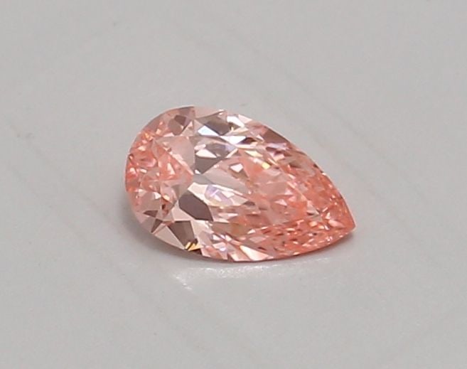 Loose Diamond - PEAR 0.38ct Fancy Vivid Pink VS1: Loose Diamond - PEAR 0.38ct Fancy Vivid Pink VS1 Source: This is a real non-mined Diamond that has been grown in a lab Shape: PEAR Carats: 0.38 Color: Fancy Vivid Pink Certification: IGI Video: