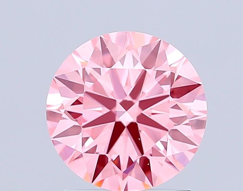 Ideal Loose Diamond - ROUND 1.5ct Fancy Vivid Pink VS2: Ideal Loose Diamond - ROUND 1.5ct Fancy Vivid Pink VS2 Source: This is a real non-mined Diamond that has been grown in a lab Shape: ROUND Carats: 1.5 Color: Fancy Vivid Pink Certification: IGI Video: