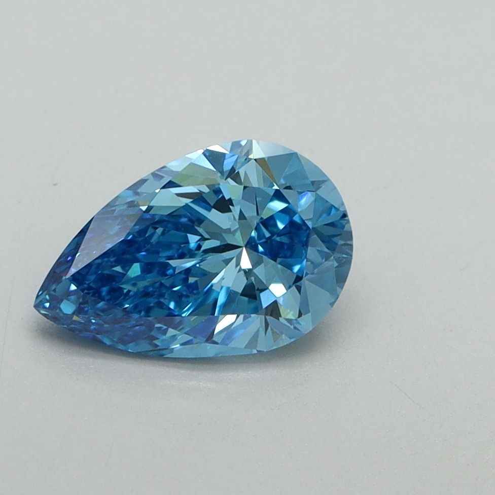 Loose Diamond - PEAR 1.02ct Fancy Vivid Blue VVS2: Loose Diamond - PEAR 1.02ct Fancy Vivid Blue VVS2 Source: This is a real non-mined Diamond that has been grown in a lab Shape: PEAR Carats: 1.02 Color: Fancy Vivid Blue Certification: IGI Video: