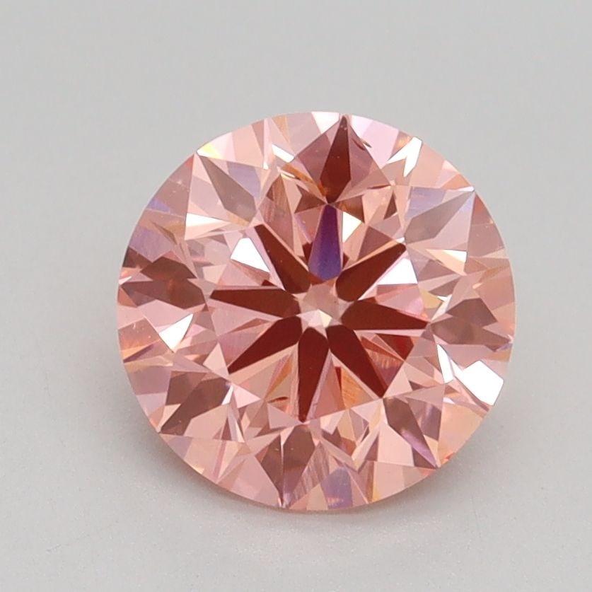 Ideal Loose Diamond - ROUND 1.7ct Fancy Vivid Pink VS2: Ideal Loose Diamond - ROUND 1.7ct Fancy Vivid Pink VS2 Source: This is a real non-mined Diamond that has been grown in a lab Shape: ROUND Carats: 1.7 Color: Fancy Vivid Pink Certification: IGI Video: