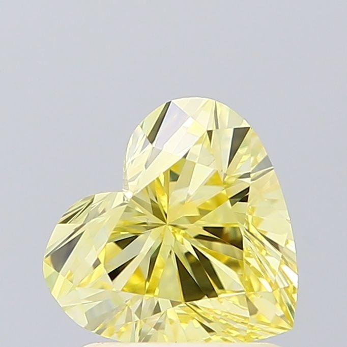 Loose Diamond - HEART 1.18ct Fancy Intense Yellow VS1: Loose Diamond - HEART 1.18ct Fancy Intense Yellow VS1 Source: This is a real non-mined Diamond that has been grown in a lab Shape: HEART Carats: 1.18 Color: Fancy Intense Yellow Certification: IGI Vid