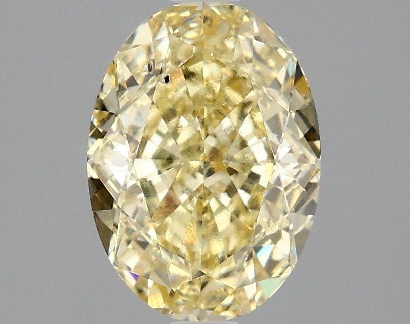 Loose Diamond - OVAL 2.1ct Fancy Intense Yellow SI1: Loose Diamond - OVAL 2.1ct Fancy Intense Yellow SI1 Source: This is a real non-mined Diamond that has been grown in a lab Shape: OVAL Carats: 2.1 Color: Fancy Intense Yellow Certification: IGI Video: