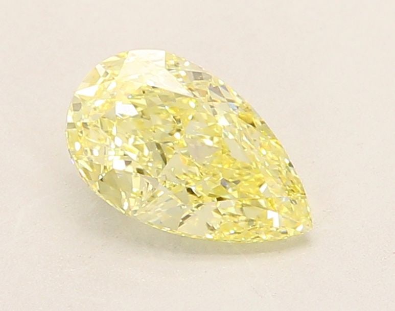 Loose Diamond - PEAR 1.27ct Fancy Yellow VVS2: Loose Diamond - PEAR 1.27ct Fancy Yellow VVS2 Source: This is a real non-mined Diamond that has been grown in a lab Shape: PEAR Carats: 1.27 Color: Fancy Yellow Certification: IGI Video: