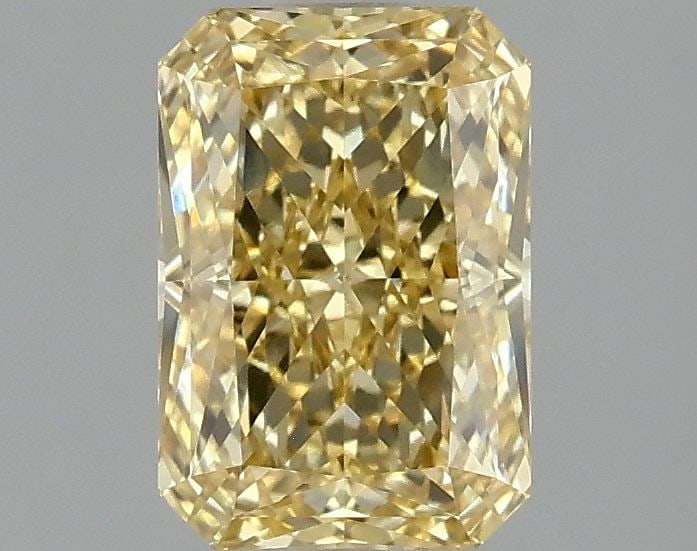 Loose Diamond - RADIANT 1.59ct Fancy Vivid Yellow VVS2: Loose Diamond - RADIANT 1.59ct Fancy Vivid Yellow VVS2 Source: This is a real non-mined Diamond that has been grown in a lab Shape: RADIANT Carats: 1.59 Color: Fancy Vivid Yellow Certification: IGI Vi
