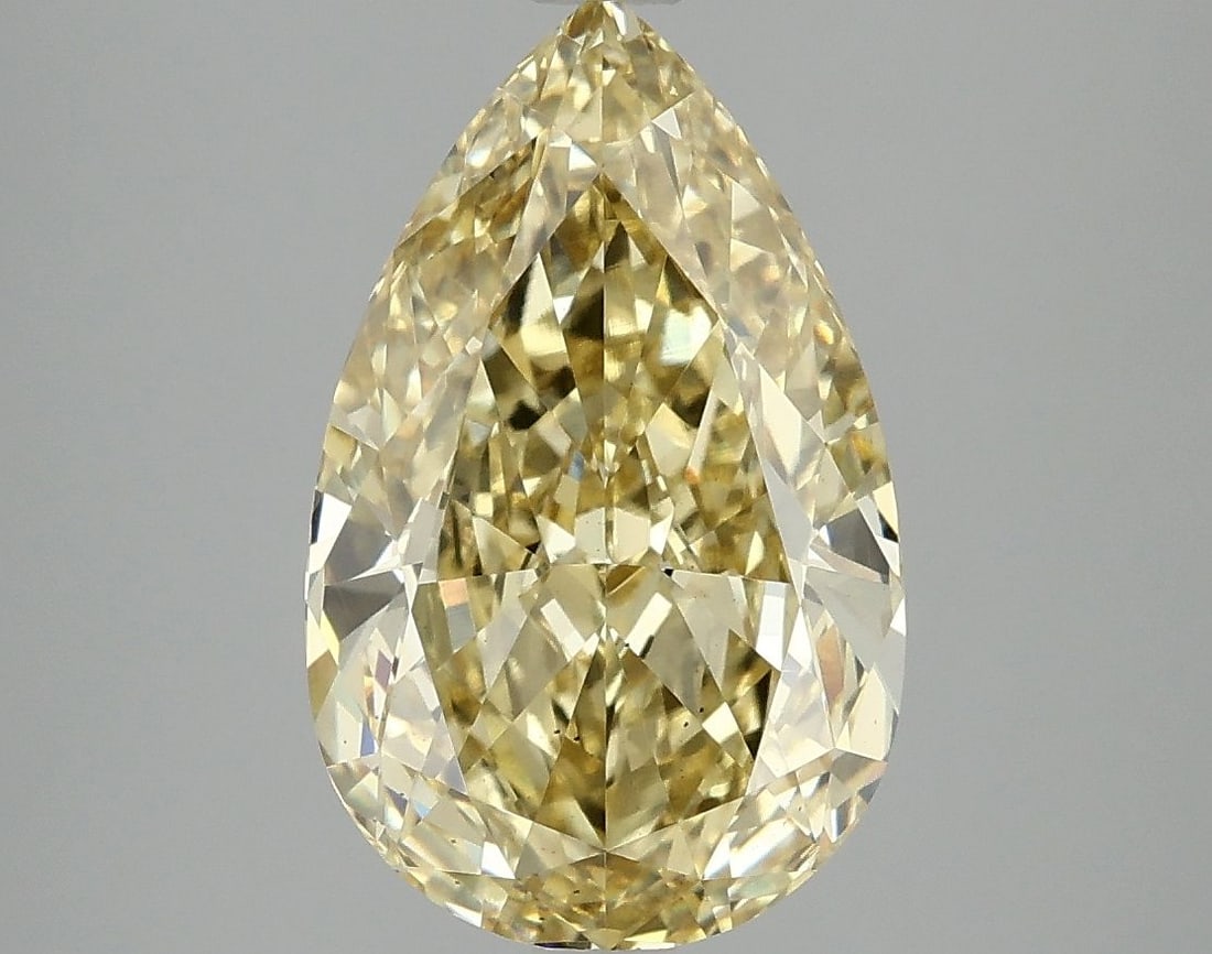 Loose Diamond - PEAR 4.05ct Fancy Vivid Yellow VS2: Loose Diamond - PEAR 4.05ct Fancy Vivid Yellow VS2 Source: This is a real non-mined Diamond that has been grown in a lab Shape: PEAR Carats: 4.05 Color: Fancy Vivid Yellow Certification: IGI Video: