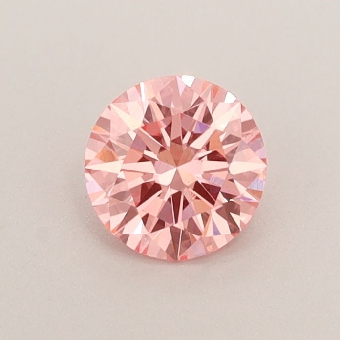 Loose Diamond - ROUND 0.44ct Fancy Vivid Pink VS1: Loose Diamond - ROUND 0.44ct Fancy Vivid Pink VS1 Source: This is a real non-mined Diamond that has been grown in a lab Shape: ROUND Carats: 0.44 Color: Fancy Vivid Pink Certification: IGI Video: