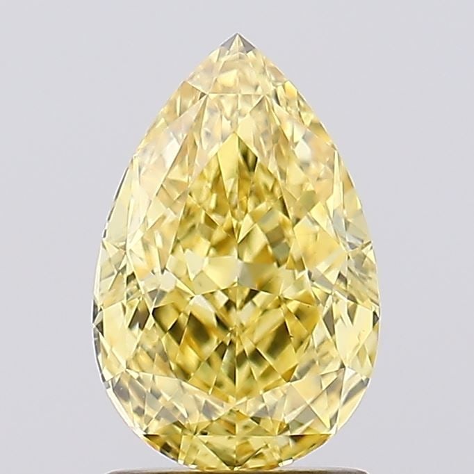 Loose Diamond - PEAR 1.73ct Fancy Vivid Yellow VS1: Loose Diamond - PEAR 1.73ct Fancy Vivid Yellow VS1 Source: This is a real non-mined Diamond that has been grown in a lab Shape: PEAR Carats: 1.73 Color: Fancy Vivid Yellow Certification: IGI Video: