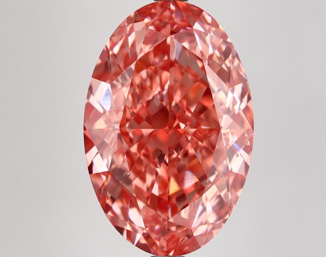 Loose Diamond - OVAL 9.04ct Fancy Vivid Pink VVS2: Loose Diamond - OVAL 9.04ct Fancy Vivid Pink VVS2 Source: This is a real non-mined Diamond that has been grown in a lab Shape: OVAL Carats: 9.04 Color: Fancy Vivid Pink Certification: IGI Video: