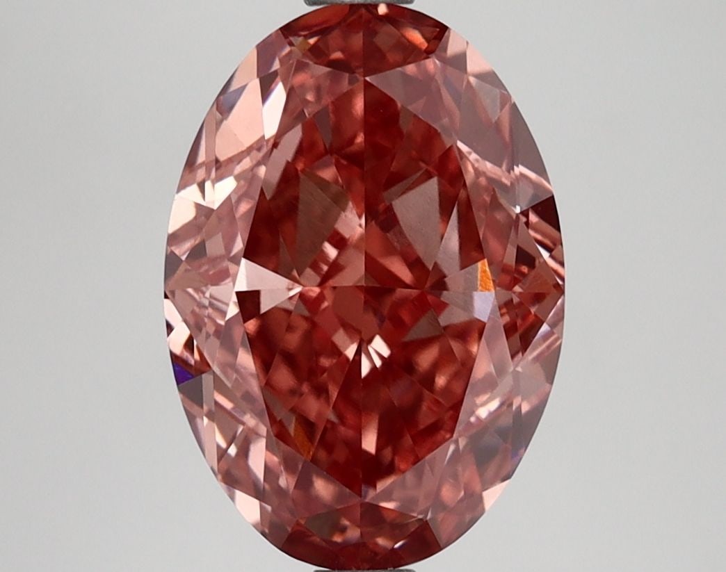 Loose Diamond - OVAL 3.39ct Fancy Vivid Brownish Pink VS1: Loose Diamond - OVAL 3.39ct Fancy Vivid Brownish Pink VS1 Source: This is a real non-mined Diamond that has been grown in a lab Shape: OVAL Carats: 3.39 Color: Fancy Vivid Brownish Pink Certification: