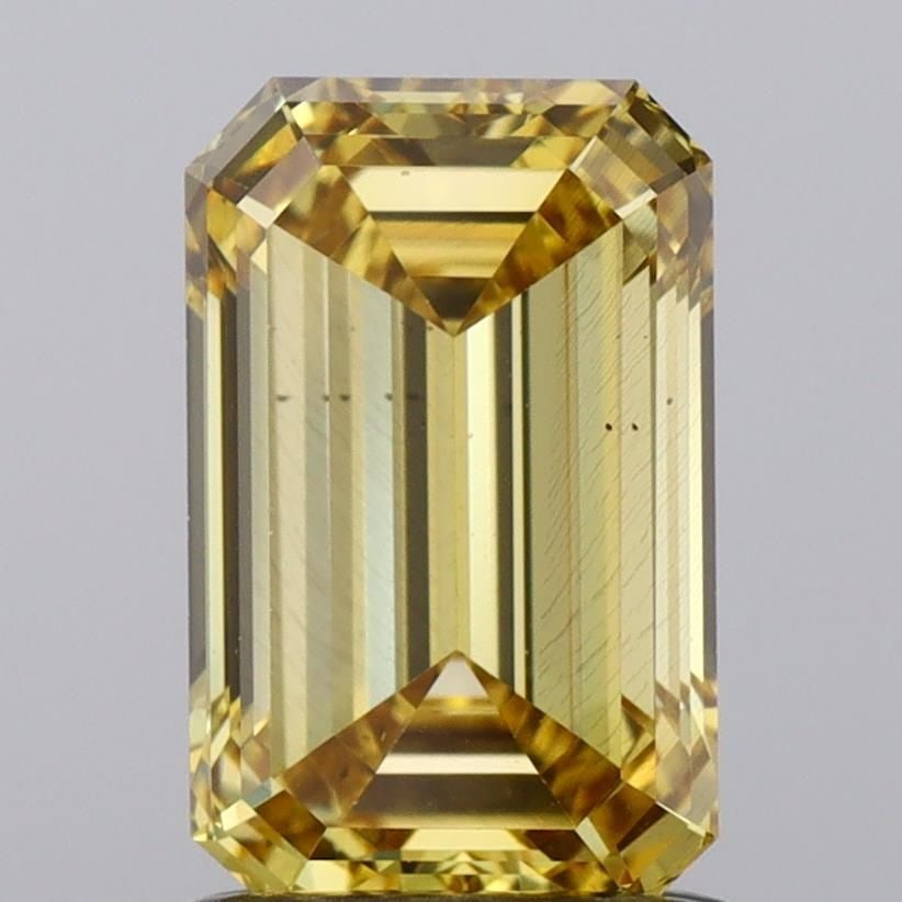 Loose Diamond - EMERALD 1.39ct Fancy Vivid Yellow VS2: Loose Diamond - EMERALD 1.39ct Fancy Vivid Yellow VS2 Source: This is a real non-mined Diamond that has been grown in a lab Shape: EMERALD Carats: 1.39 Color: Fancy Vivid Yellow Certification: NONE Vi
