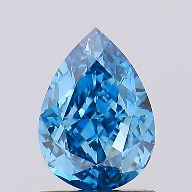 Loose Diamond - PEAR 1.13ct Fancy Vivid Blue VS2: Loose Diamond - PEAR 1.13ct Fancy Vivid Blue VS2 Source: This is a real non-mined Diamond that has been grown in a lab Shape: PEAR Carats: 1.13 Color: Fancy Vivid Blue Certification: IGI Video: