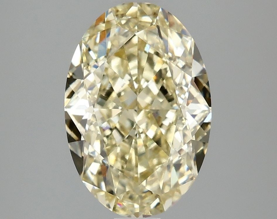 Loose Diamond - OVAL 3.05ct Fancy Yellow VS1: Loose Diamond - OVAL 3.05ct Fancy Yellow VS1 Source: This is a real non-mined Diamond that has been grown in a lab Shape: OVAL Carats: 3.05 Color: Fancy Yellow Certification: IGI Video: