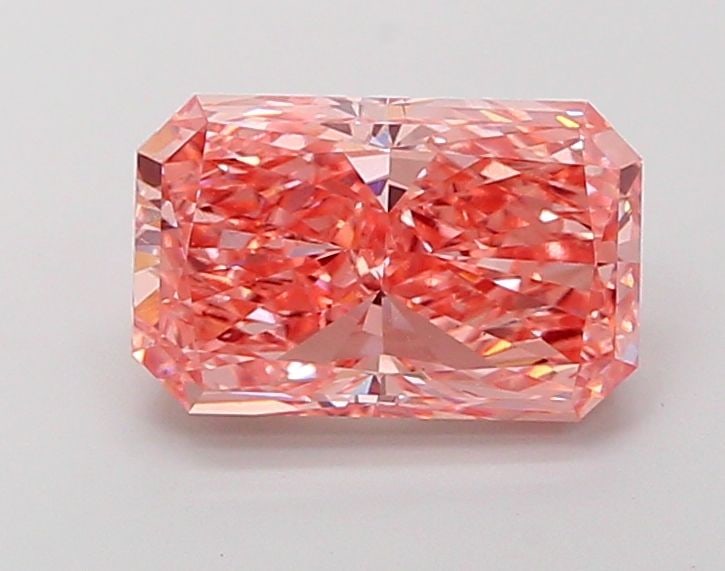 Loose Diamond - RADIANT 4.1ct Fancy Vivid Pink VS1: Loose Diamond - RADIANT 4.1ct Fancy Vivid Pink VS1 Source: This is a real non-mined Diamond that has been grown in a lab Shape: RADIANT Carats: 4.1 Color: Fancy Vivid Pink Certification: IGI Video: