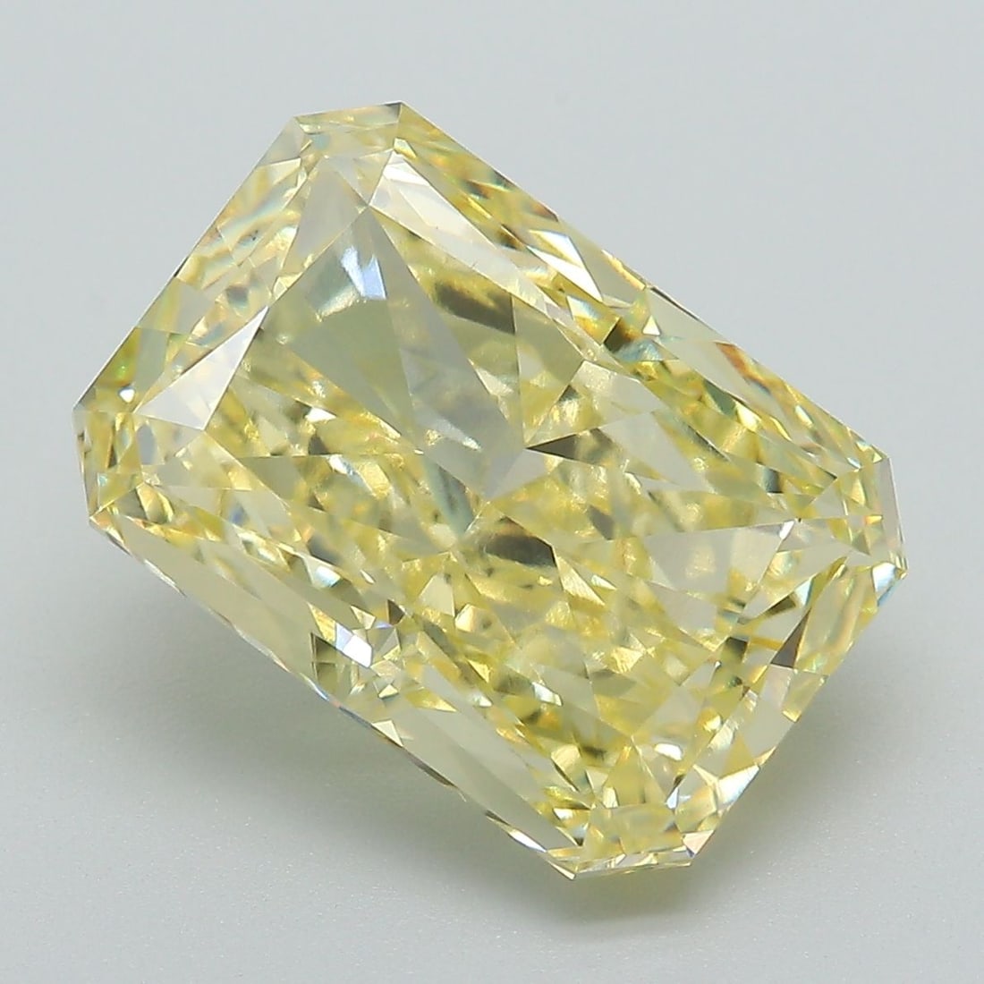Loose Diamond - RADIANT 7.12ct Fancy Vivid Yellow VS1: Loose Diamond - RADIANT 7.12ct Fancy Vivid Yellow VS1 Source: This is a real non-mined Diamond that has been grown in a lab Shape: RADIANT Carats: 7.12 Color: Fancy Vivid Yellow Certification: IGI Vid