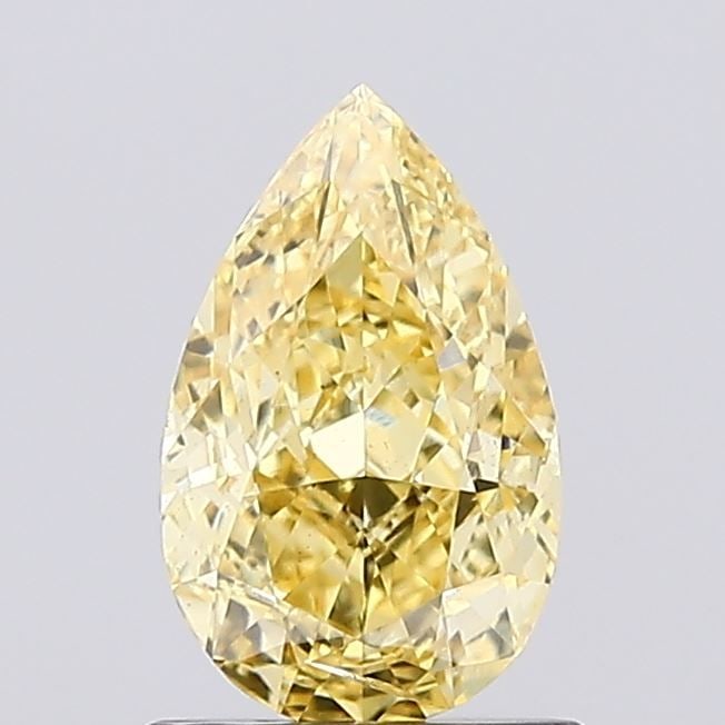 Loose Diamond - PEAR 1.03ct Fancy Vivid Yellow SI2: Loose Diamond - PEAR 1.03ct Fancy Vivid Yellow SI2 Source: This is a real non-mined Diamond that has been grown in a lab Shape: PEAR Carats: 1.03 Color: Fancy Vivid Yellow Certification: IGI Video: