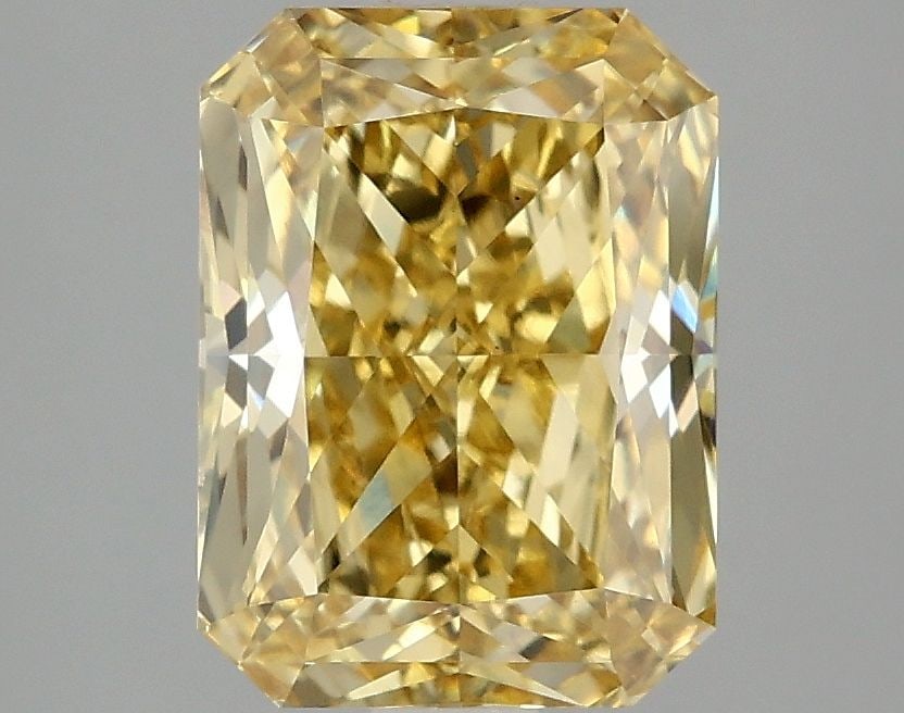 Loose Diamond - RADIANT 3.03ct Fancy Vivid Yellow VS1: Loose Diamond - RADIANT 3.03ct Fancy Vivid Yellow VS1 Source: This is a real non-mined Diamond that has been grown in a lab Shape: RADIANT Carats: 3.03 Color: Fancy Vivid Yellow Certification: IGI Vid