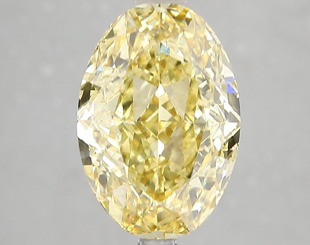 Loose Diamond - OVAL 4.04ct Fancy Vivid Yellow SI1: Loose Diamond - OVAL 4.04ct Fancy Vivid Yellow SI1 Source: This is a real non-mined Diamond that has been grown in a lab Shape: OVAL Carats: 4.04 Color: Fancy Vivid Yellow Certification: IGI Video: