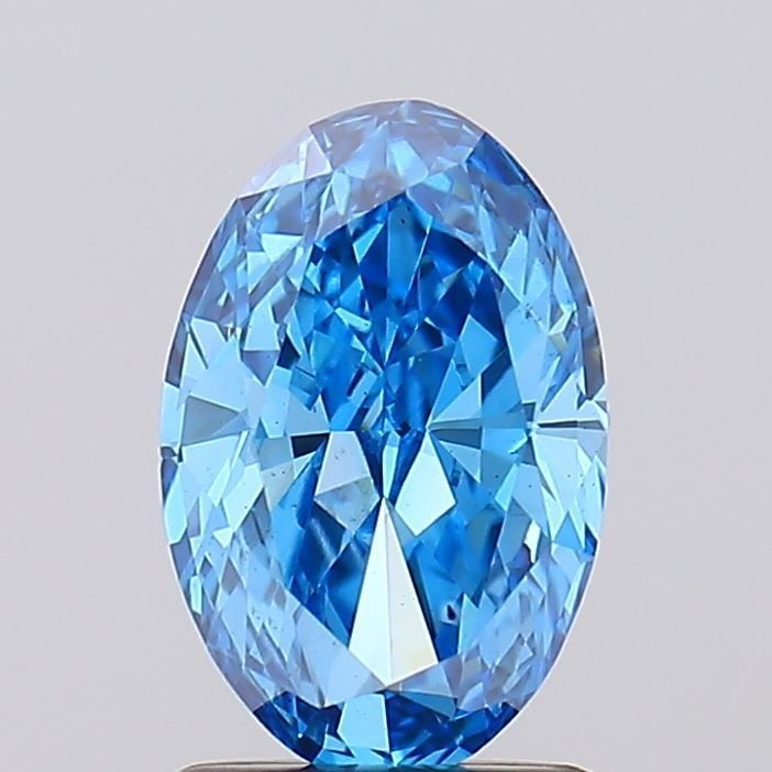 Loose Diamond - OVAL 1.23ct Fancy Vivid Blue VS2: Loose Diamond - OVAL 1.23ct Fancy Vivid Blue VS2 Source: This is a real non-mined Diamond that has been grown in a lab Shape: OVAL Carats: 1.23 Color: Fancy Vivid Blue Certification: IGI Video: