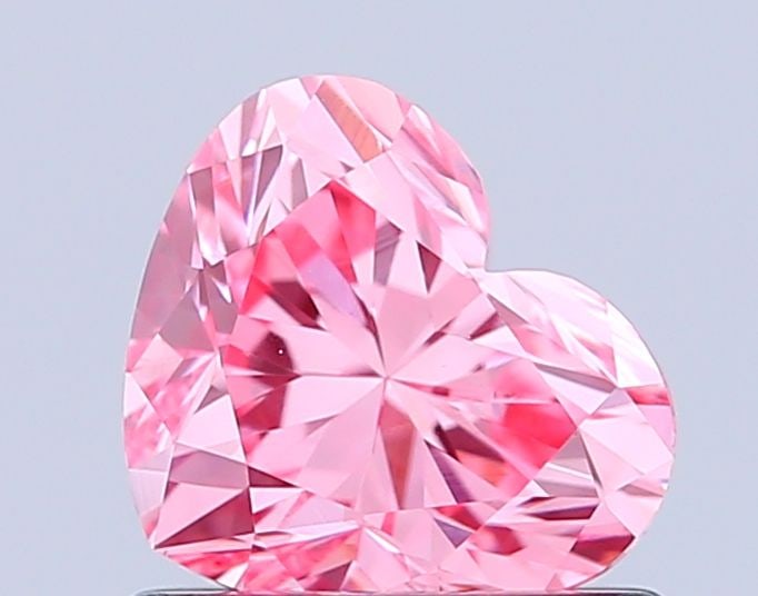 Loose Diamond - HEART 0.85ct Fancy Vivid Pink VS1: Loose Diamond - HEART 0.85ct Fancy Vivid Pink VS1 Source: This is a real non-mined Diamond that has been grown in a lab Shape: HEART Carats: 0.85 Color: Fancy Vivid Pink Certification: IGI Video: