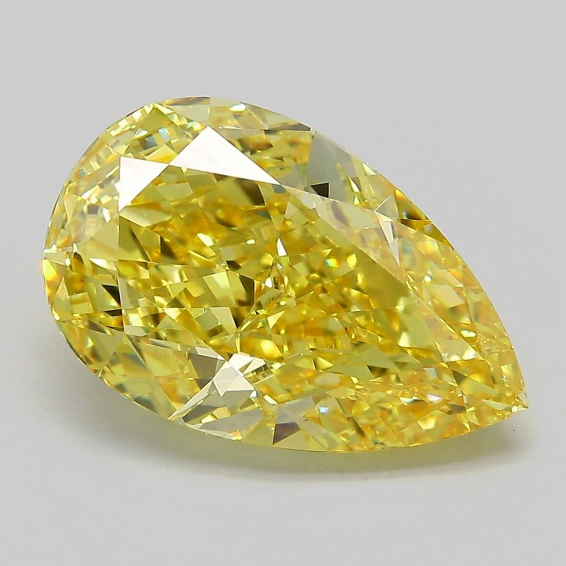 Loose Diamond - PEAR 6.01ct Fancy Vivid Yellow VS1: Loose Diamond - PEAR 6.01ct Fancy Vivid Yellow VS1 Source: This is a real non-mined Diamond that has been grown in a lab Shape: PEAR Carats: 6.01 Color: Fancy Vivid Yellow Certification: IGI Video: