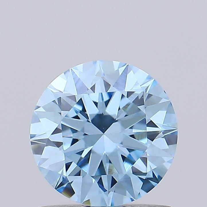Loose Diamond - ROUND 0.93ct Fancy Vivid Blue VS1: Loose Diamond - ROUND 0.93ct Fancy Vivid Blue VS1 Source: This is a real non-mined Diamond that has been grown in a lab Shape: ROUND Carats: 0.93 Color: Fancy Vivid Blue Certification: IGI Video: