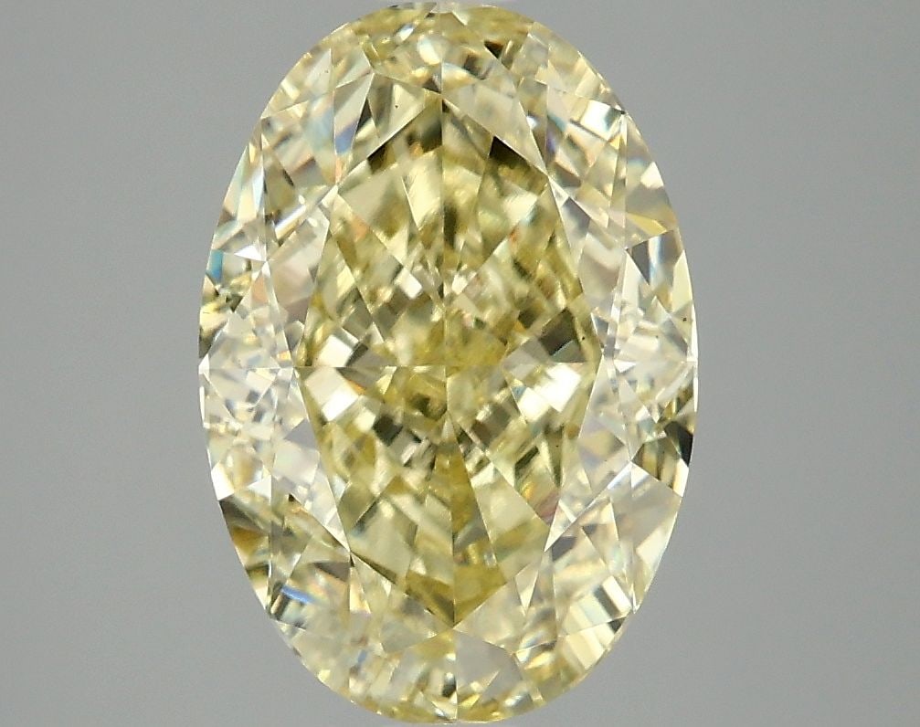 Loose Diamond - OVAL 4.06ct Fancy Intense Yellow VS1: Loose Diamond - OVAL 4.06ct Fancy Intense Yellow VS1 Source: This is a real non-mined Diamond that has been grown in a lab Shape: OVAL Carats: 4.06 Color: Fancy Intense Yellow Certification: IGI Video