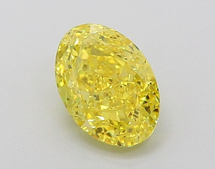 Loose Diamond - OVAL 1.03ct Fancy Vivid Yellow VVS2: Loose Diamond - OVAL 1.03ct Fancy Vivid Yellow VVS2 Source: This is a real non-mined Diamond that has been grown in a lab Shape: OVAL Carats: 1.03 Color: Fancy Vivid Yellow Certification: IGI Video: