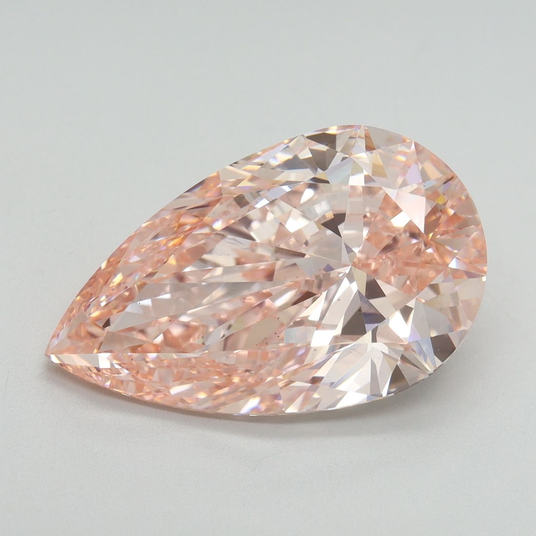 Loose Diamond - PEAR 9.56ct Fancy Vivid Pink VS2: Loose Diamond - PEAR 9.56ct Fancy Vivid Pink VS2 Source: This is a real non-mined Diamond that has been grown in a lab Shape: PEAR Carats: 9.56 Color: Fancy Vivid Pink Certification: IGI Video:
