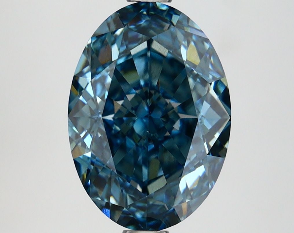 Loose Diamond - OVAL 3.09ct Fancy Vivid Green Blue VS1: Loose Diamond - OVAL 3.09ct Fancy Vivid Green Blue VS1 Source: This is a real non-mined Diamond that has been grown in a lab Shape: OVAL Carats: 3.09 Color: Fancy Vivid Green Blue Certification: IGI V